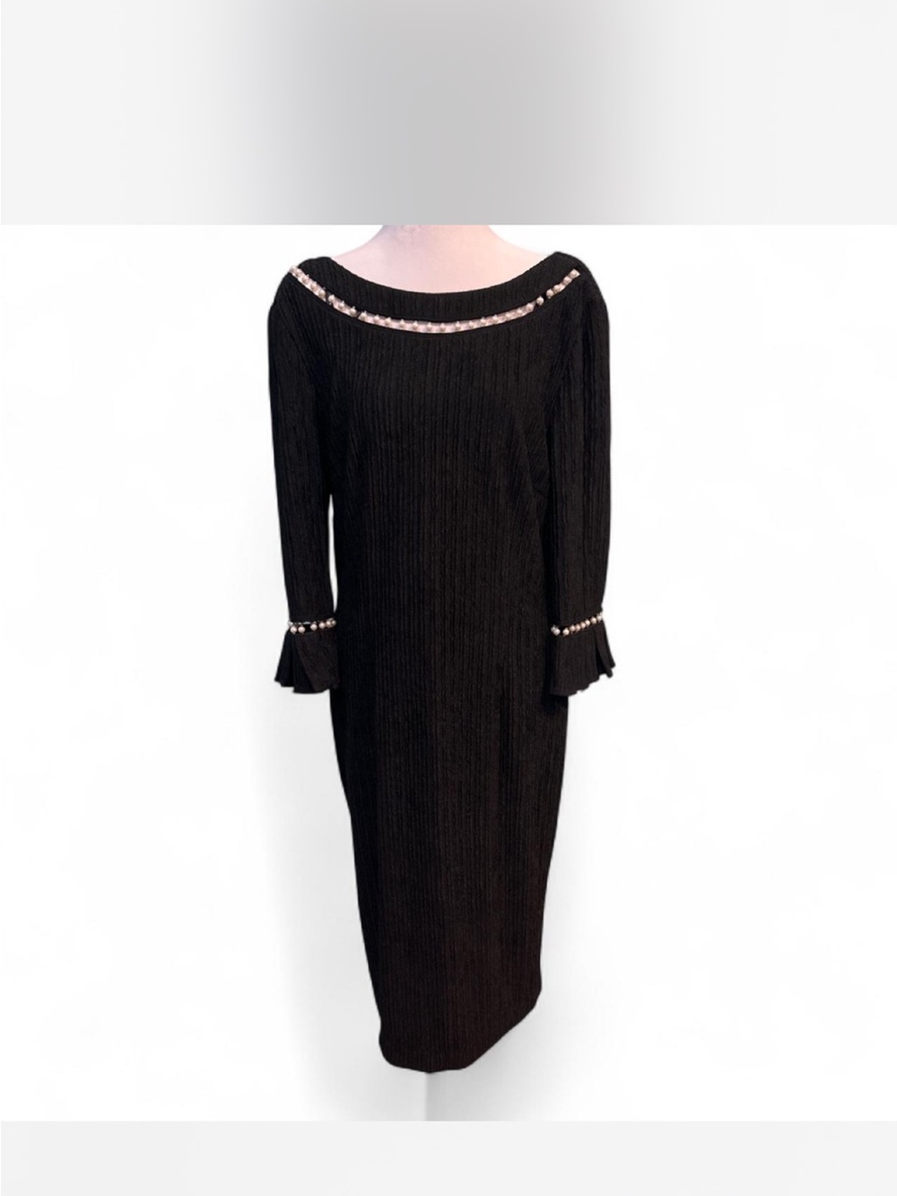 Black ribbed long dress with pearl trim on neckline and cuffs